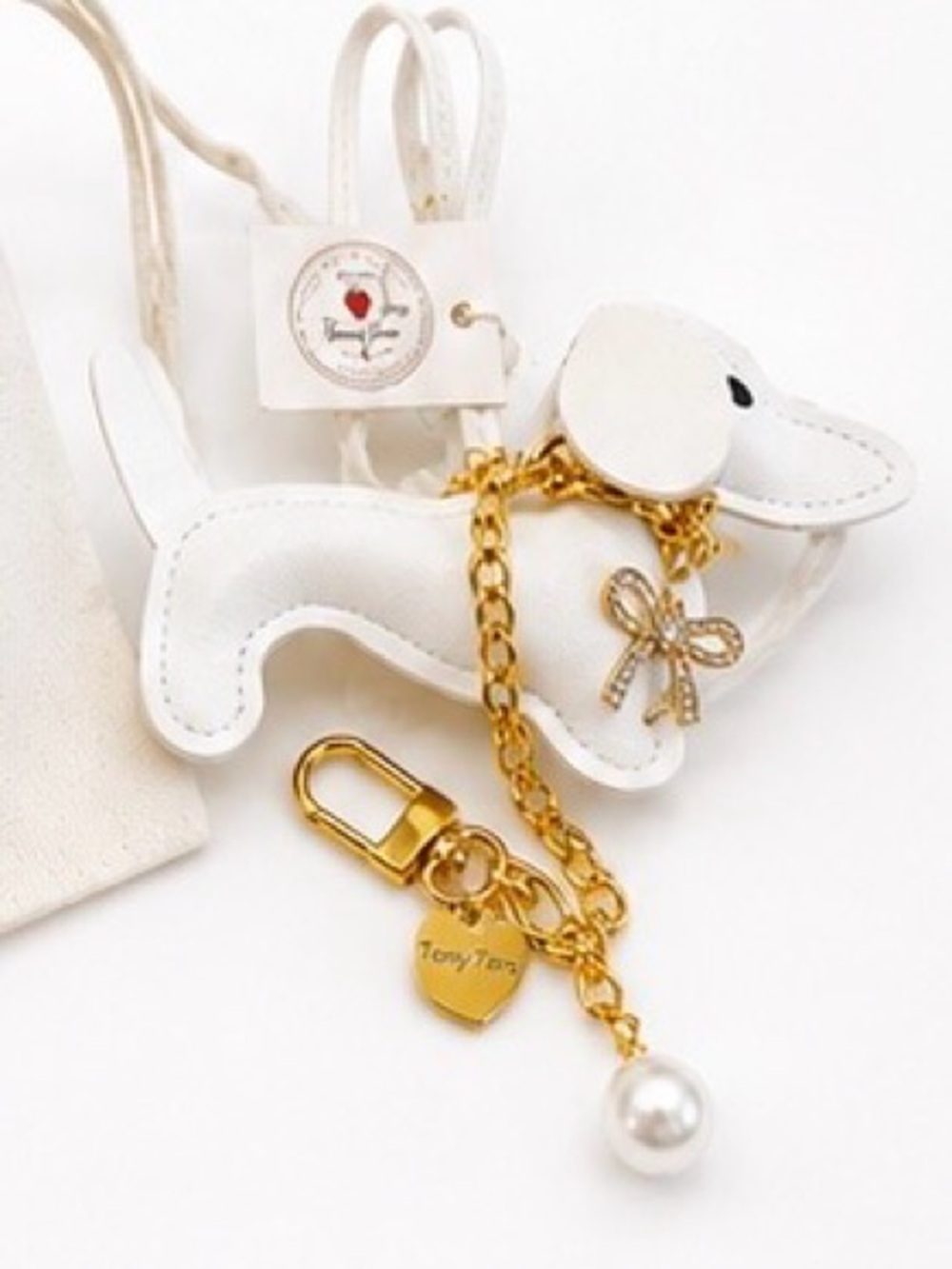NWT White Leather Dachshund Bag Charm | 18K Gold Stainless
πΆπ€ - Picture 9 of 10